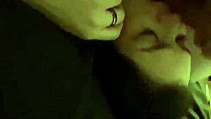 laying down licking balls, close-up style