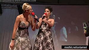 Female and male strippers tease crowd with erotic dance moves