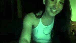A playful teen indulges in solo pleasure