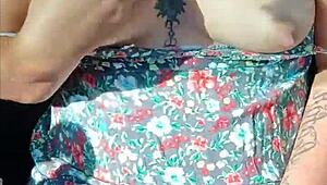 showing off naked in a moving car for public view