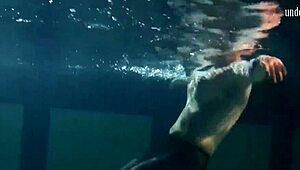 Lozhkova lounges in see-through shorts by the pool