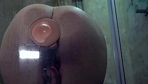 babe sucks dildo and fucks herself in shower orgasm