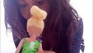 who's hotter, me or my doll with stunning fake tits?