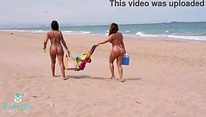 lesbians on the beach share intimate moments in private space