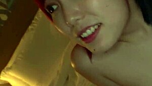 red-haired gal plays clarinet then gets hardcore blowjob and titjob in hotel with vibrator in pussy