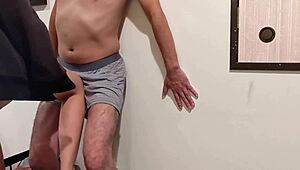 Femdom bitch laughs while kicking and slapping m-man's cock.