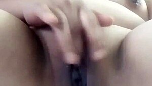 Pornstar poosoo intensely fingers her pussy in solo masturbation