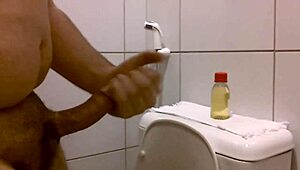 oil handjob leads to cum