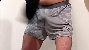 Femdom bitch laughs while kicking and slapping m-man's cock.