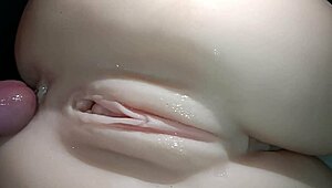 Sexual close-up of penis sliding into snow-white tight ass