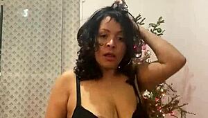 Anna Maria, the sexy Latina, dances in a steamy Christmas video with Caribbean flair