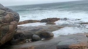 petite latina teen with big natural tits poses at the beach