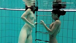 markova and zlata, those hot russian lesbians, fooling around underwater in the pool