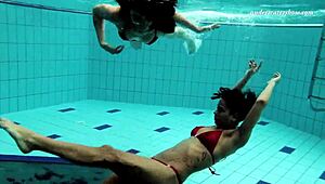markova and zlata, those hot russian lesbians, fooling around underwater in the pool