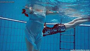 Holy cow! Dashka and Vesta, teen 18+ babes, get wild underwater in sexy bikinis!