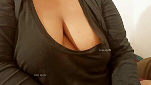 asian aunty teases with her massive big tits on display