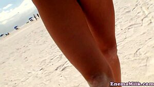 Babes feel intense pleasure in bizarre enema fetish, rimming each other in the shower