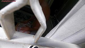 watching my half-brother fuck his wife through the window, rough and moaning in the bedroom.