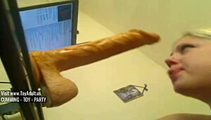 blonde deep throats huge dildo, wanna see her cum?