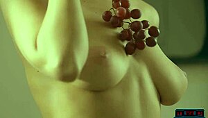 Perfect blonde babe Margo Dumas shows off her big round ass in a striptease