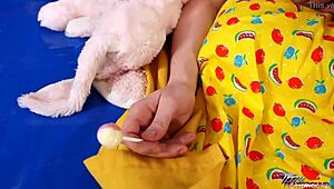 Short-haired cute redhead licks lolipop before sucking