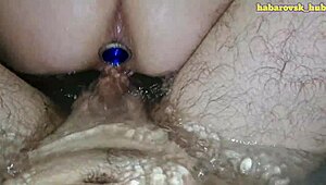 Double penetration and fisting in the bathroom shower