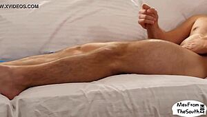 Horny American gay dude, uh, mastrubates solo with ripped clothes. Man, those tattoos hot!