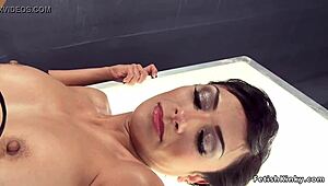 dom in fishnets dominates busty bound lesbian