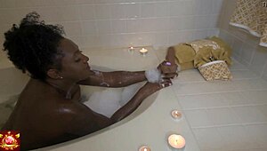 Giana, the ebony bbw babe, soaks her pretty pussy while masturbating.