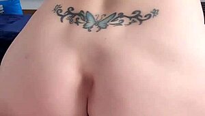 Petite blonde woman enjoys a solo ride on a large dildo.