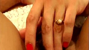 Hairy Wife from the Nineties Explores Solo Pleasure with Toys. This Blonde MILF Babe Turns Up the Heat in Her Private Moment.