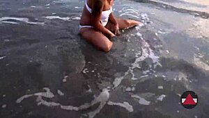 Beach day turned messy with wet asian bikini model fetish! 🌊