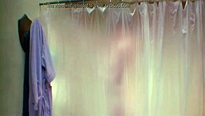 Sexy brunette enjoys nude bathing in shower for Friday the 13th