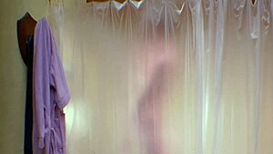 Sexy brunette enjoys nude bathing in shower for Friday the 13th