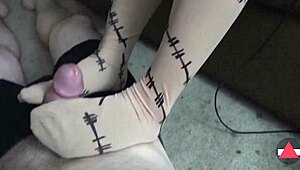 she gives a pre-cum footjob in pantyhose