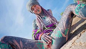 Tattooed slut with pierced pussy gets anal fucked outdoors