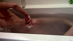 i watch this cute skinny blonde take a bath naked with panties on christmas with a clown