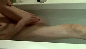 Slender blonde Violet's steamy Christmas bath time