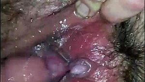 he loves teasing her hairy pussy in close-up homemade video