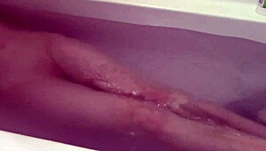 Slender blonde Violet's steamy Christmas bath time