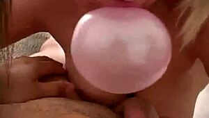 A petite slut gives a POV blowjob and teases with bubble gum in hardcore video