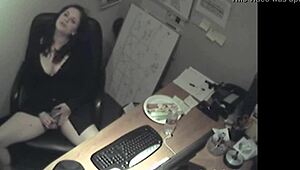 Horny secretary rubs big tits while masturbating in office hidden cam.