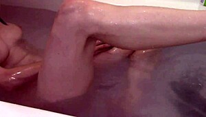 i watch this cute skinny blonde take a bath naked with panties on christmas with a clown