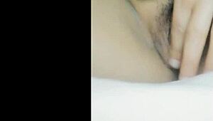 Chinese beauty indulges in self-pleasure