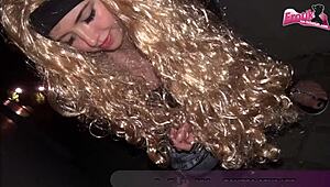 german young woman in public street scene