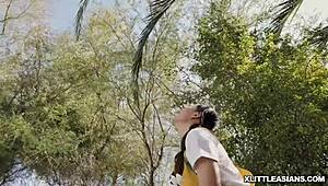 Asian teen Ella Voneva gets her pussy rammed by Diamond Banks with strap on.