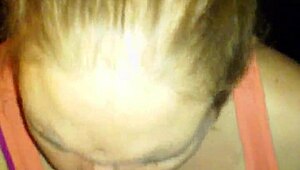 Wife boldly swallows black cock in interracial session.