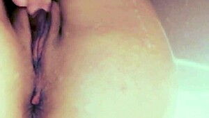 I'm just caressing my pussy in the bathroom, feeling so sexy