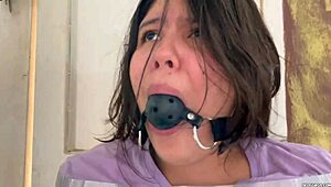 ball gagged girl struggles hard in barefoot tape bondage challenge