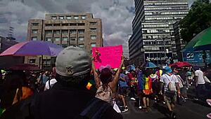 giving kisses in cdmx with miniskirt on lgbt march day, flashing big ass